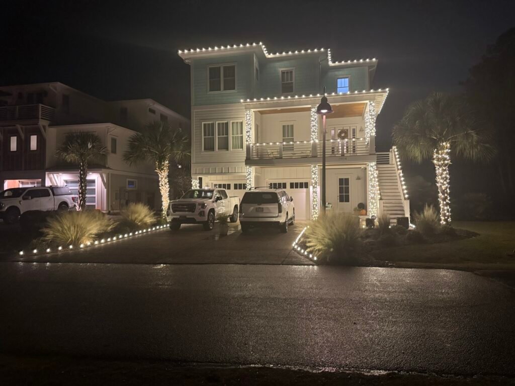Christmas lights on a raised beach house by Shark Illumination