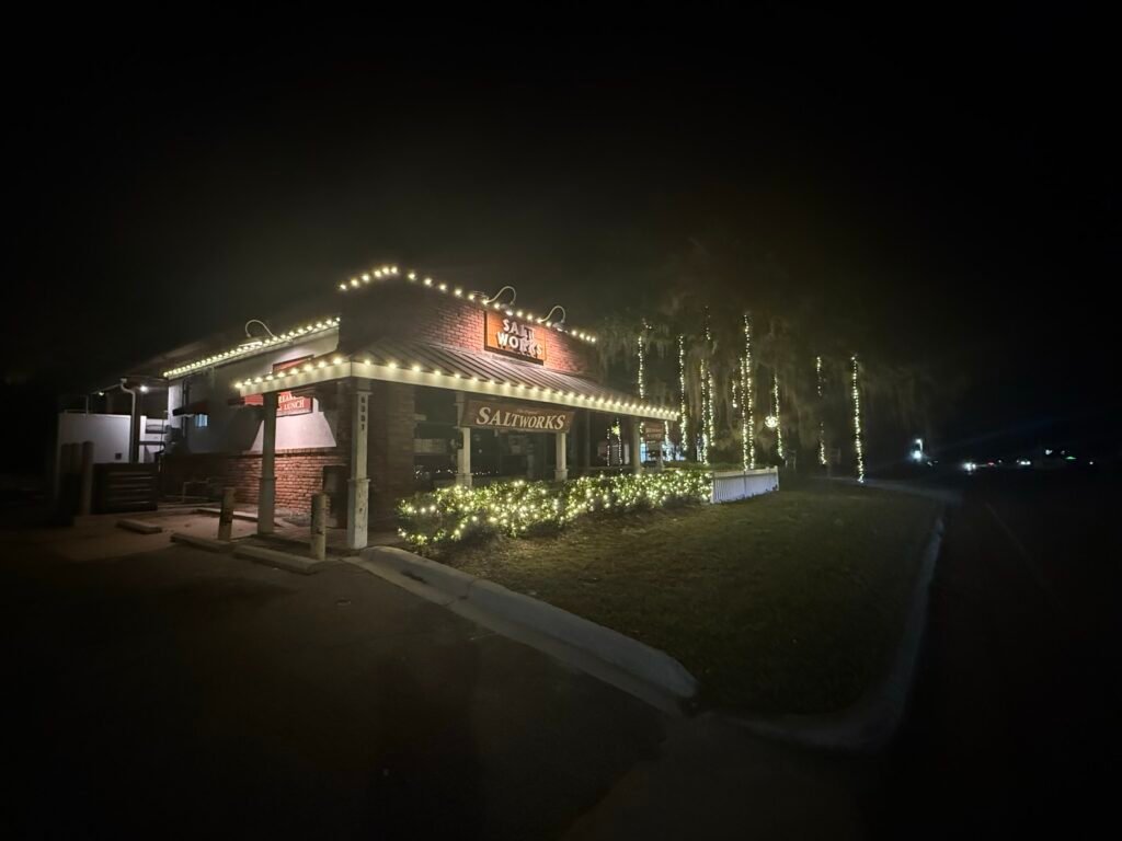 Commercial roofline lighting on a business building by Shark Illumination