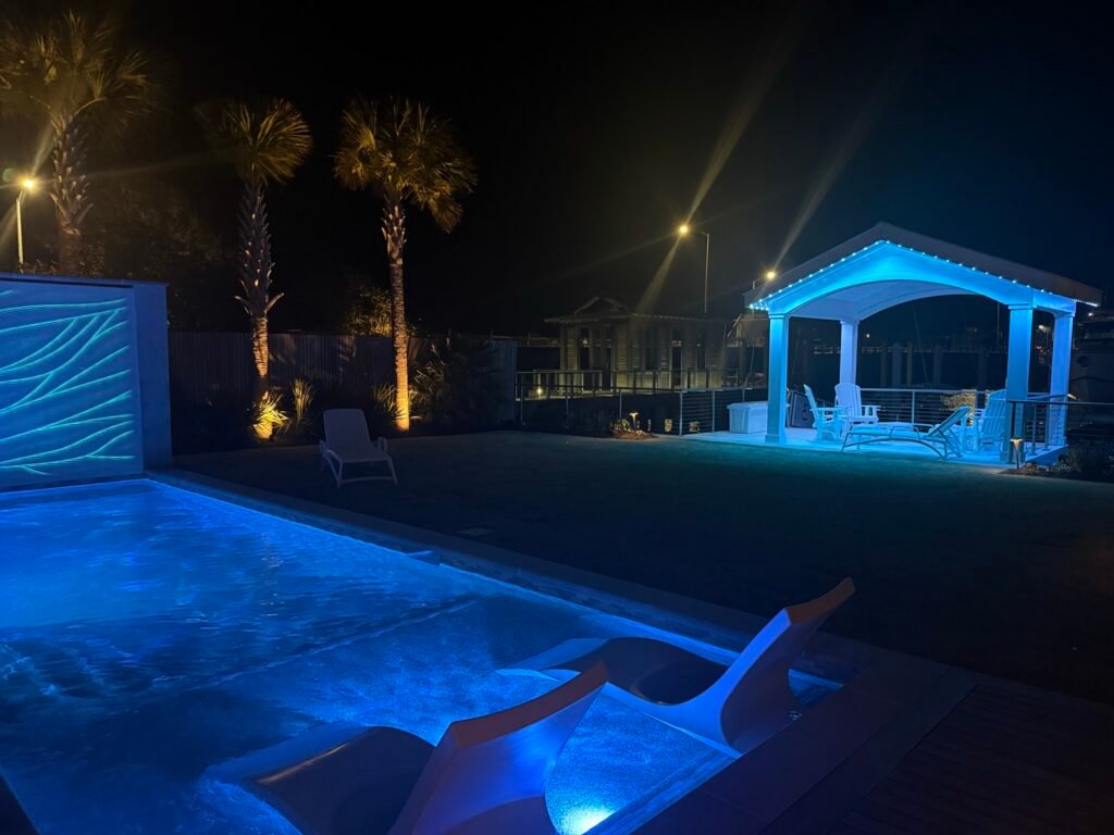 Permanent lighting in blue on a pool gazebo by Shark Illumination